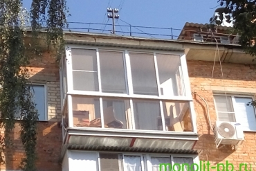 Балкон «под ключ» (предварительная замена плиты) с «французским» остеклением алюминиевыми рамами, крышей, оштукатуриванием и покраской стены дома на ул. Сойфера г. Тула.
